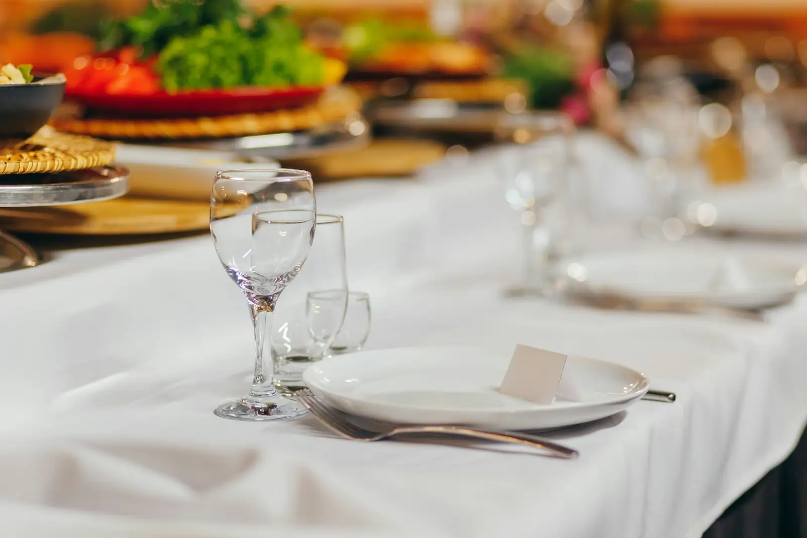 A formal dining table set for a banquet