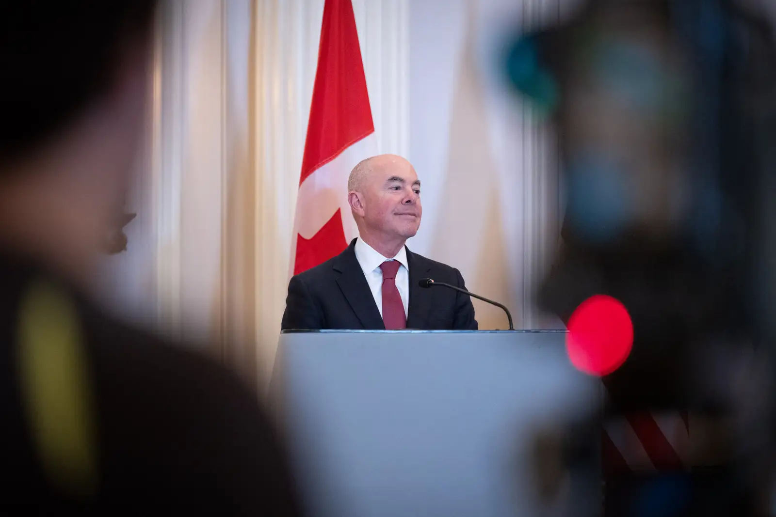 Officials speaking at a press conference in Canada