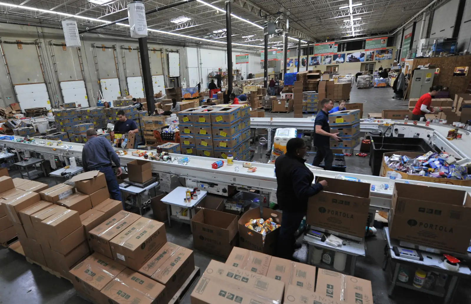Volunteers organizing food bank donations