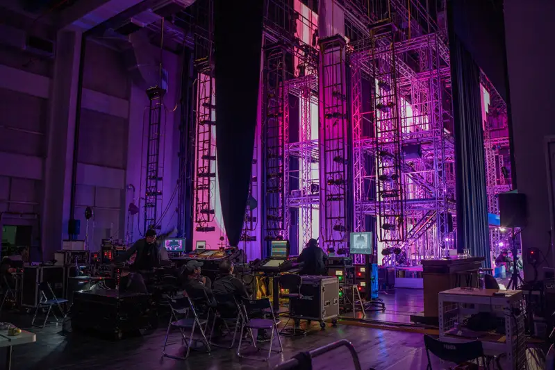 Production equipment and stage infrastructure behind an event