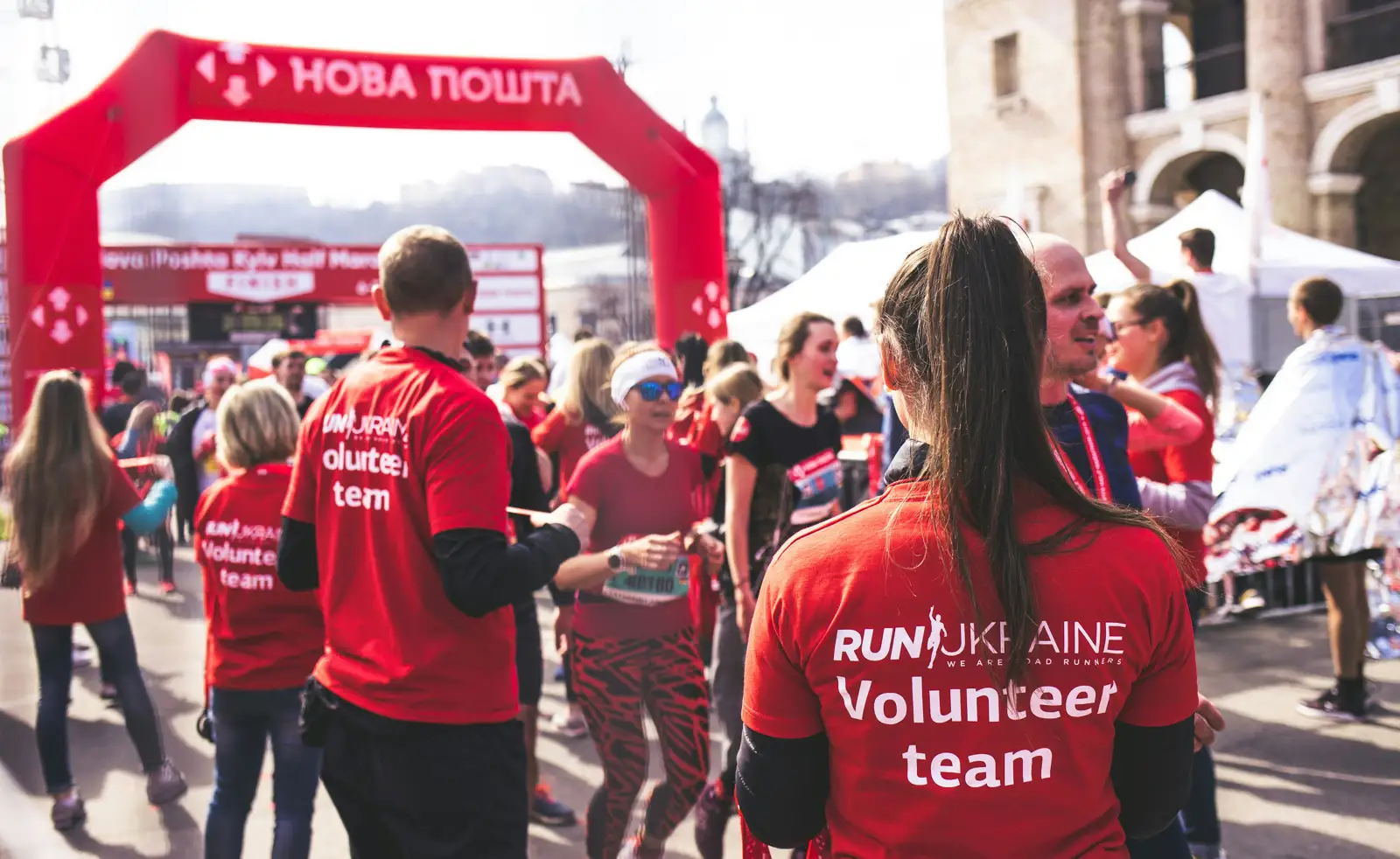 Volunteer team gathered at a community running event